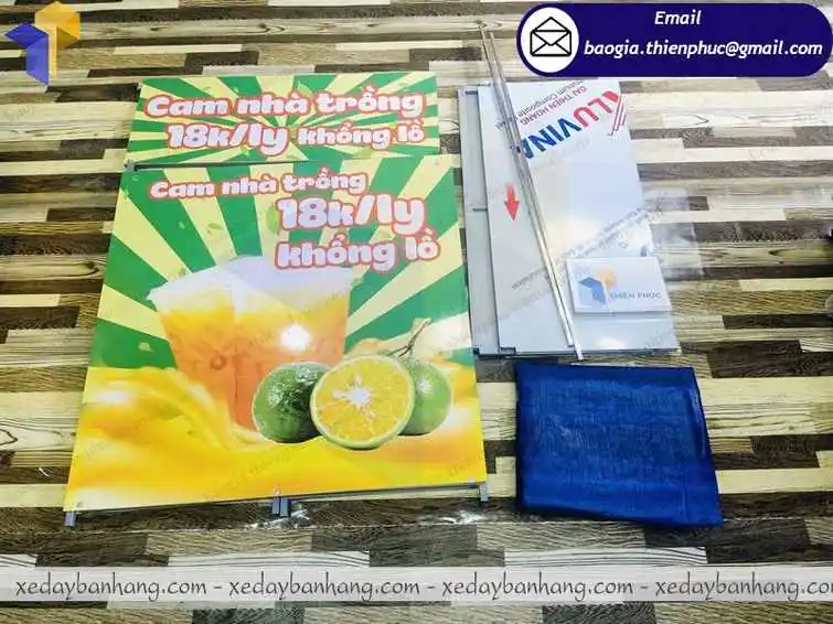 quầy bán nước cam vỉa hè đẹp